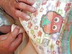 Boy And Girl In Wet Goodnites Diapers Plat With A Dildo