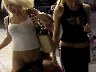 Two Cute Girls shopping at the ninety nine cent store are being stocked by a pair of creepsters. One Time they go out side one of the dudes runs up and pulls the blond's pants down. Is there grass on the field?