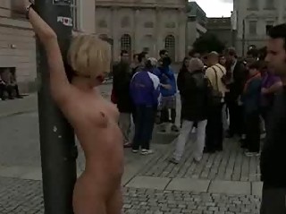 Blonde tied and exposed in public