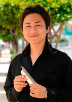 Okinawan player comes second in World Harmonica Festival