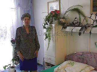 granny masturbates in front of along to mirror