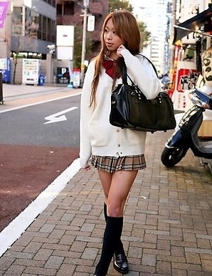 Remika Uehara poses on the street