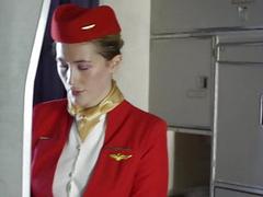 Stewardess fucks a passenger on a plane