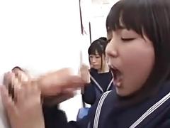 Japanese school girl blowing cock through gloryhole in class