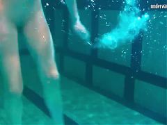 Babes swim strip and have fun underwater