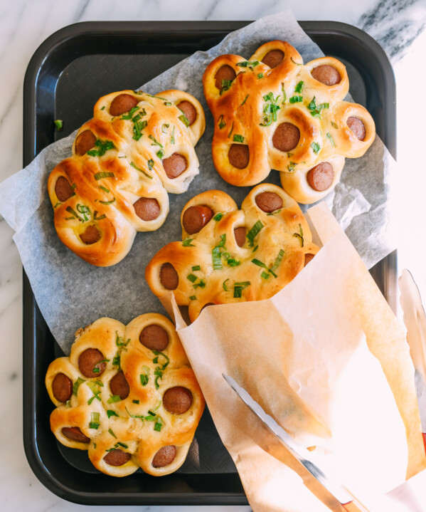 Chinese flower hot dog buns on tray