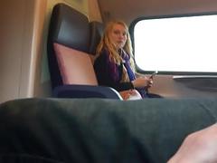 Jerking next to blond girl in train