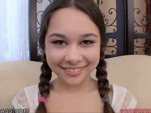 Pigtailed raunchy teen Kira Sinn eagerly taking cum facial