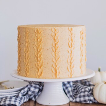 Pumpkin Sugar Cookie Cake - deliciously moist and fluffy pumpkin cake layers, with boiled milk frosting, pumpkin sugar cookies and pumpkin buttercream! #cakebycourtney #pumpkincake #pumpkindessert #desserts #fall #Falldesserts #fallcakeidea #falldessertideas