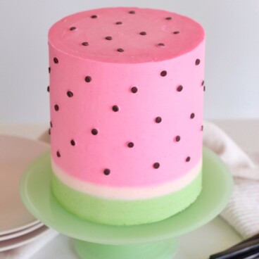 Watermelon Lime Cake: white cake layers with a watermelon simple syrup, lime curd and watermelon buttercream. #cakebycourtney #cake #cakerecipe #summercakes #cakes #watermeloncake #limecurd