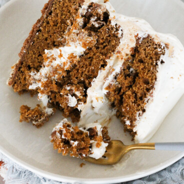 Slice of gingerbread cake on a plate.