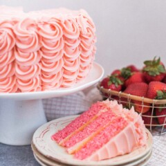 Strawberry Lemonade Cake - strawberry Jell-O cake layers with Lemond curd and strawberry buttercream - the perfect summer cake! #summercake #strawberrylemonadecake #strawberrycake #summercakerecipe #easysummercakerecipe #cakesforsummer #cakebycourtney