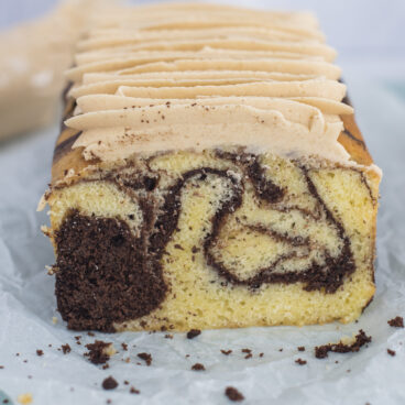 Marble loaf cake on parchment paper.