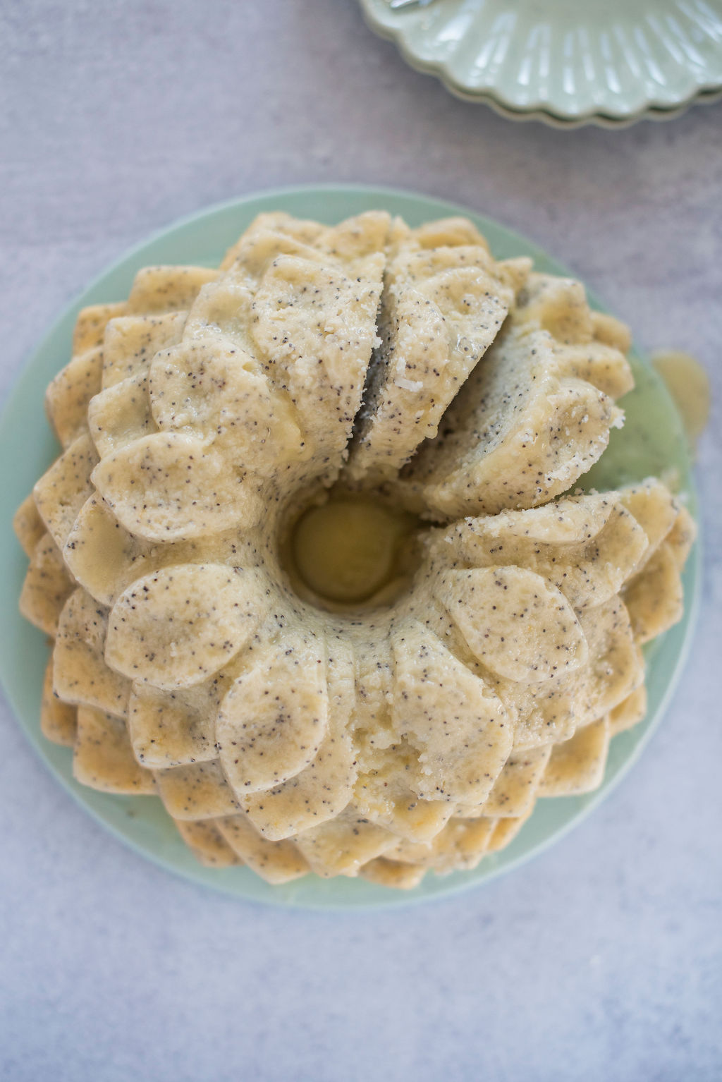 Lemon poppyseed bundt cake with a slice cut out