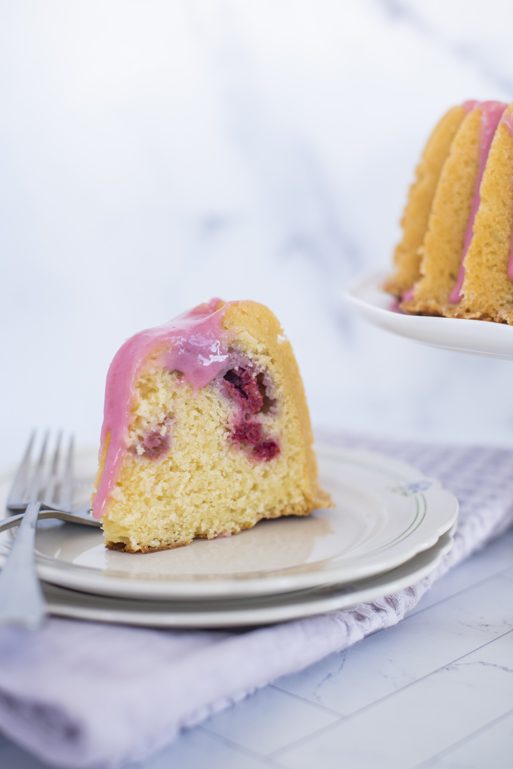 A slice of a bundt cake on a plate.