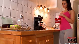 Eve Angel fingering in kitchen