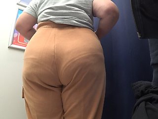 The camera in the fitting room watches a mature big ass in satin panties. Curvy milf changes clothes. PAWG