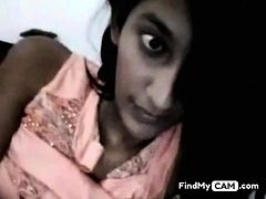 Webcam solo with an Indian chick flashing her tits