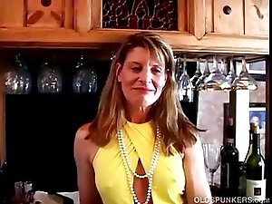 Fit mature swinger fucks her wet pussy